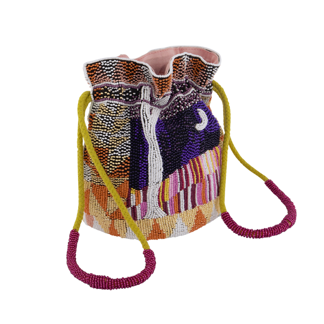An exceptional hand beaded pouch, using thousands of glass beads to create this sparkling pouch shape, with drawstring closure finished with beading on the wrist straps. Featuring the beautiful artworks of Mim Fluhrer  Hand beaded pouch shape with a drawstring closure. Cotton lined. Nancybird