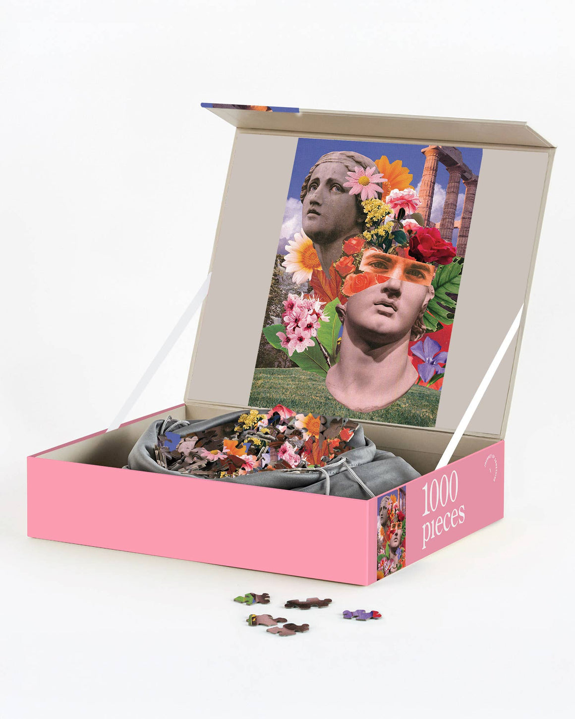 Jigsaw puzzle with a decorative box featuring a woman with flowers in her hair on a white background