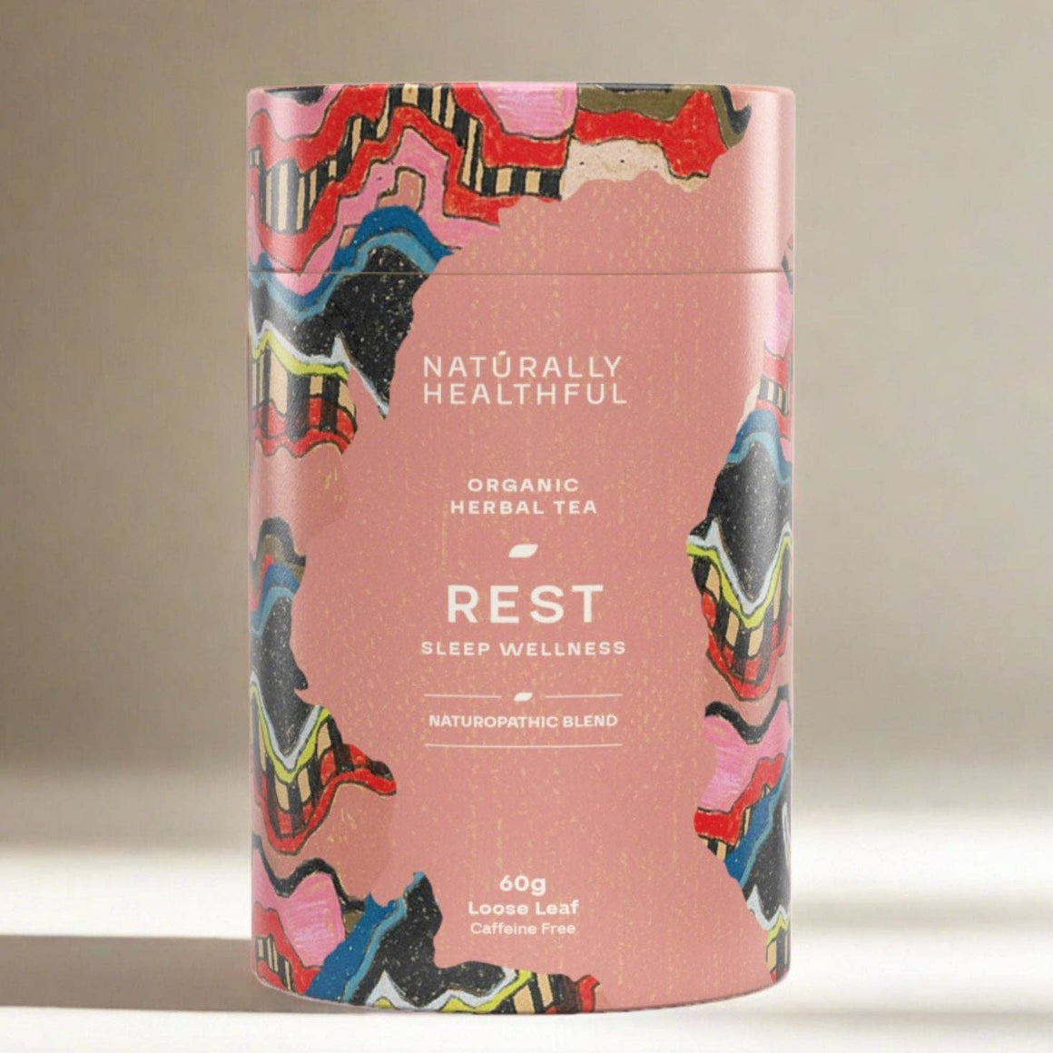 Naturopathic blended tea supporting sleep wellness in a stunning art tube