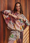 The relaxed fit of the Dahlia Batwing Sweat ensures both comfort and versatility. Crafted from premium organic cotton French terry. It not only offers a soft and cozy feel but also reflects a commitment to sustainability. It drapes elegantly on the body, and in bold artful print by Mim Fluhrer.  Long sleeve oversized batwing sweat, crew neck and length that skims the hip. By Nancybird