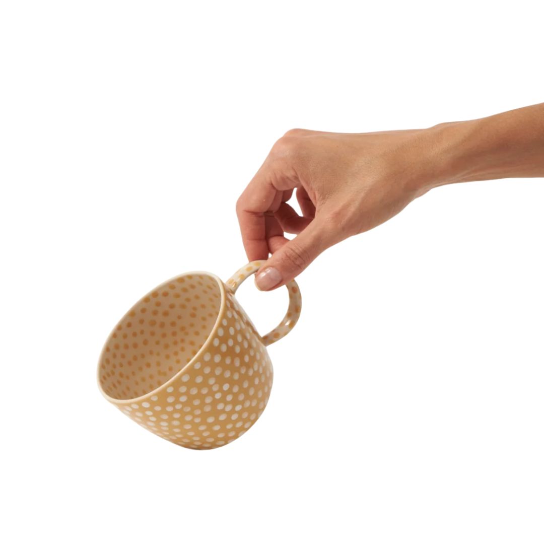 Mustard and white spot mug in the perfect drinking size