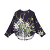 Still life featuring flannel flowers on a navy background is a bold print to liven up your everyday look.