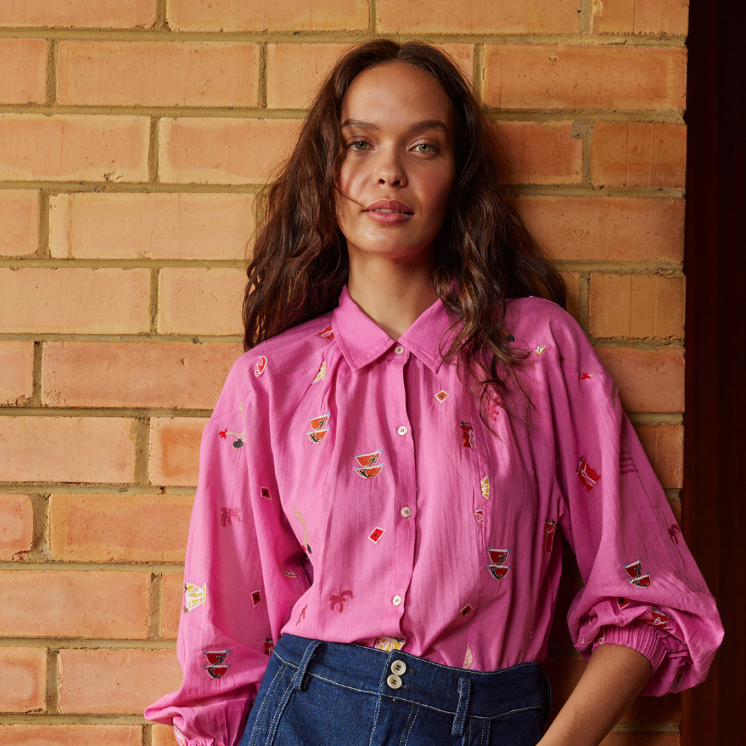 The Elena Shirt is that piece in your wardrobe that instantly elevates your outfit with minimal effort! Featuring the stunning artwork of Lucy Anderson.  Printed cotton voile long sleeve collared shirt with button through placket, shoulder panels with volume sleeves gathered onto cuff, pleats at neck seam.