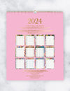 Our new beautiful 2024 Family Wall Calendars feature beautiful heavy weight stock, gold foil printed covers, gold wire binding, gold gilded edges and an appointed monthly page, with 6 “fill in your own” columns to allocate to family members, work, personal, birthdays or how ever suits you and your household.   SPECIFICATION  Month to page Calendar. Offset printed. Australian public holidays appointed.  Original artwork on each page by Misha Harrison