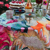 Perfect for a "garden Party" this tablecloth is a stunning edition to any home. By Emma Morgan