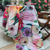 Perfect for a "garden Party" this tablecloth is a stunning edition to any home. By Emma Morgan