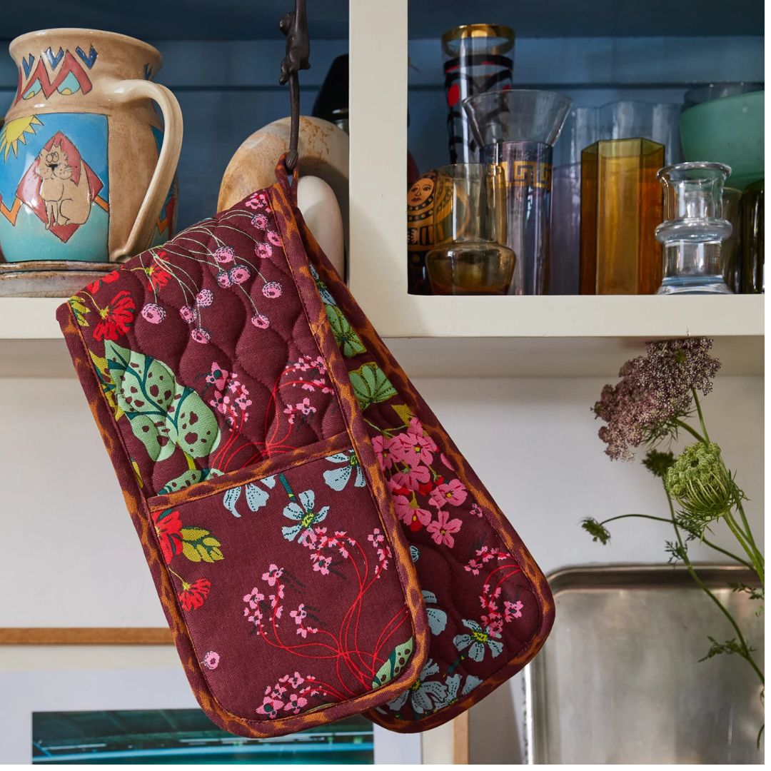 Dark eggplant background with wispy garden print is perfect offset with Leopard print contrasting trim.