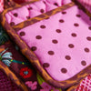 The coolest combination of prints does exist! Pink and brown polda dots, stunning botanicals and a leopard trim