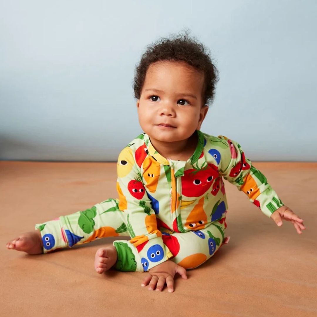 This long sleever romper really shows off the Happy Harvest print. Turn over feet keep baby warm, the zipper keeps parents sane when changing nappies