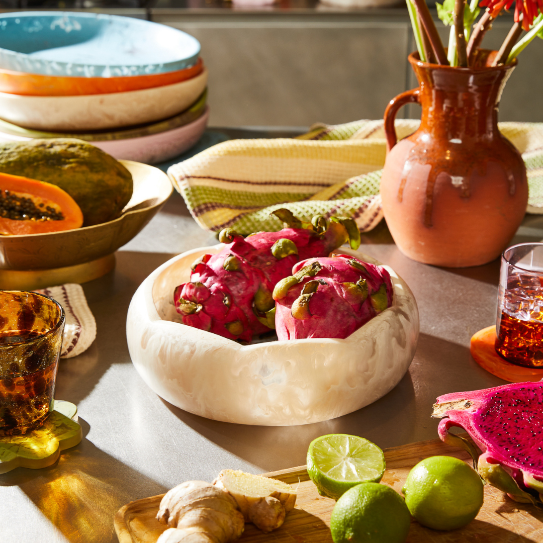 The Kabrina Bowl is inspired by mid-century design with its scalloped edge bringing '70s nostalgia to your table. In Vanilla resin, this Sage and Clare bowl is the perfect gift.