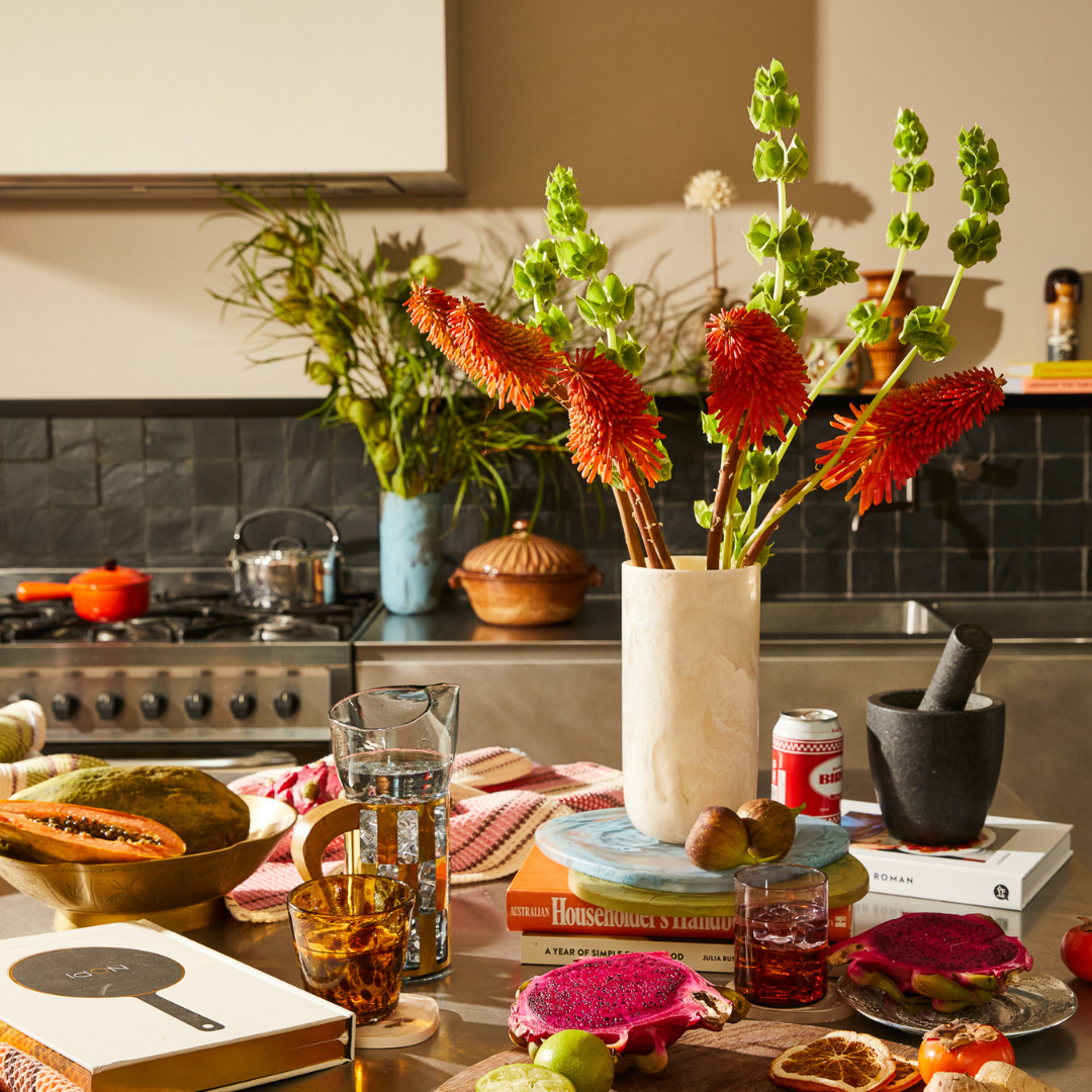 The Kalinda Vase is perfect for adding an artisanal touch to your shelf or displaying your favourite flowers. Designed in Sage and Clare's stunning Vanilla colourway – melding together delicious cream and clear resin for a refined finish. 