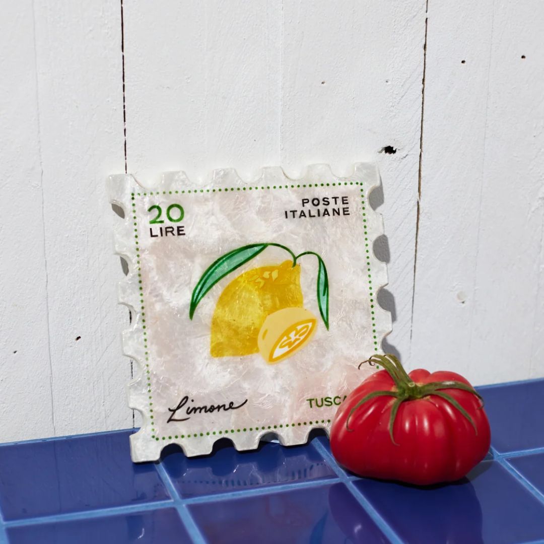 Juicy lemon featured on a wall tile, with note to Italian heritage