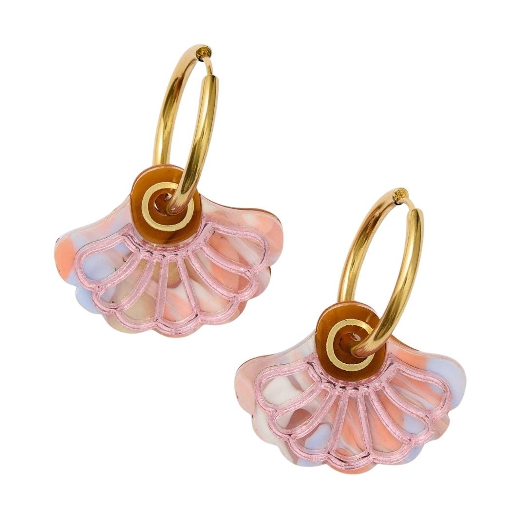 Pair of pink earrings with gold accents on a white background