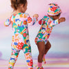 Long sleeve bodysuits are the ultimate layering tool in a babies wardrobe. Match the Rainbow Valley print with plain bottoms or amp up the print with contrasting bright colours.