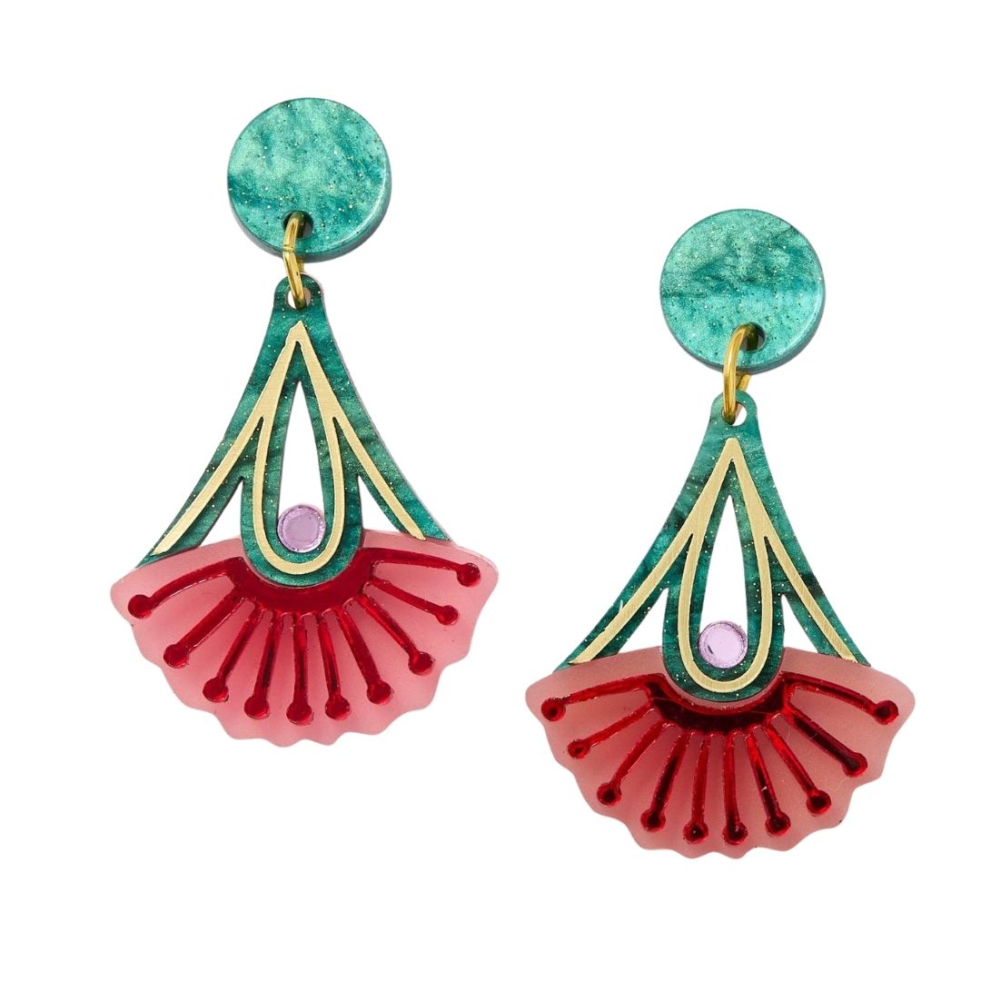 Pair of earrings with green, gold, and red design on a white background