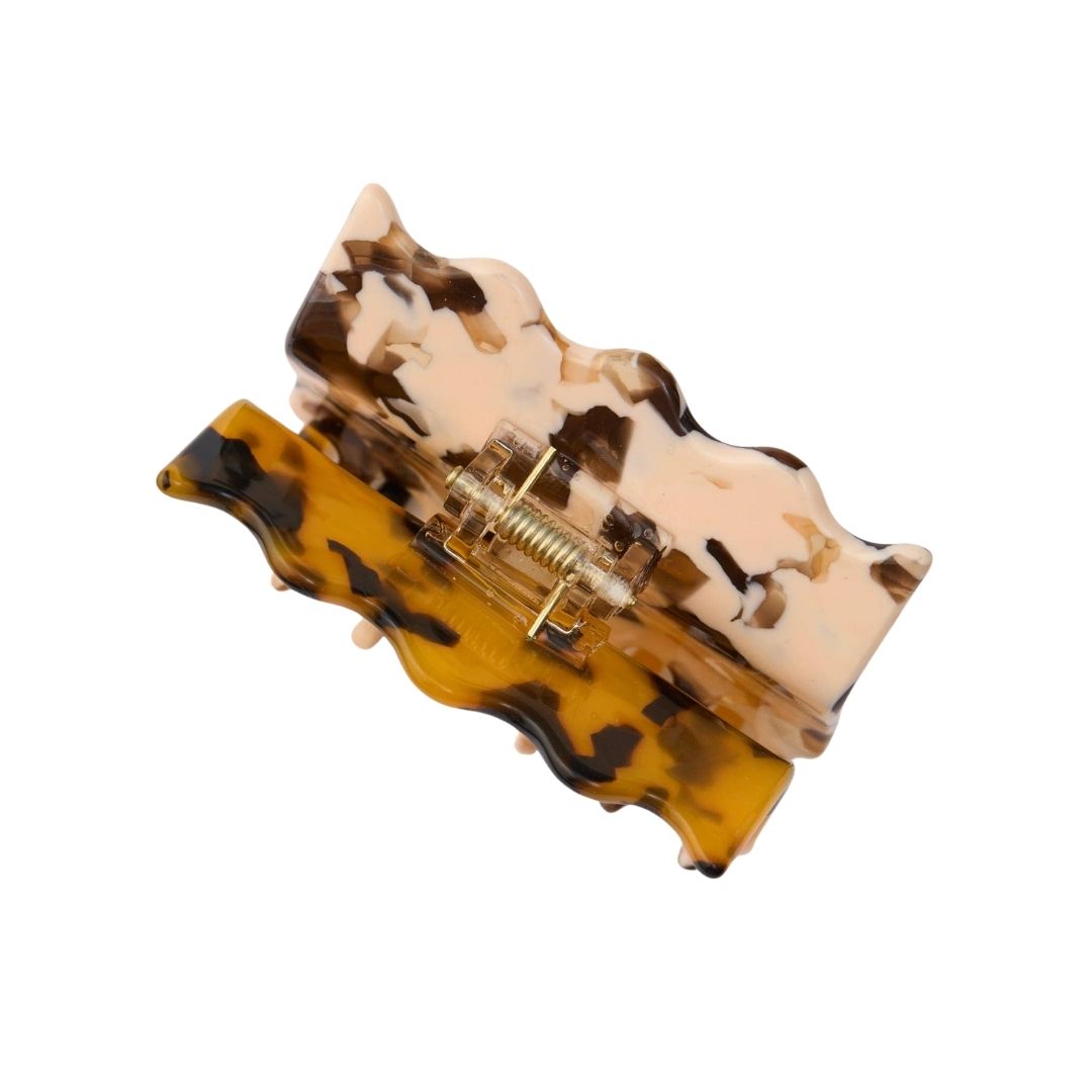 Two toned Tortoiseshell patterned hair clip on a white background