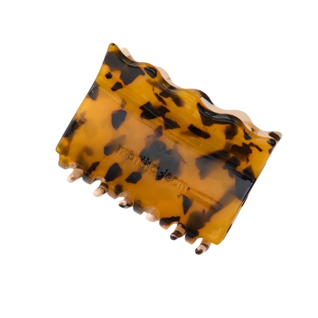 Two toned Tortoiseshell patterned hair clip on a white background