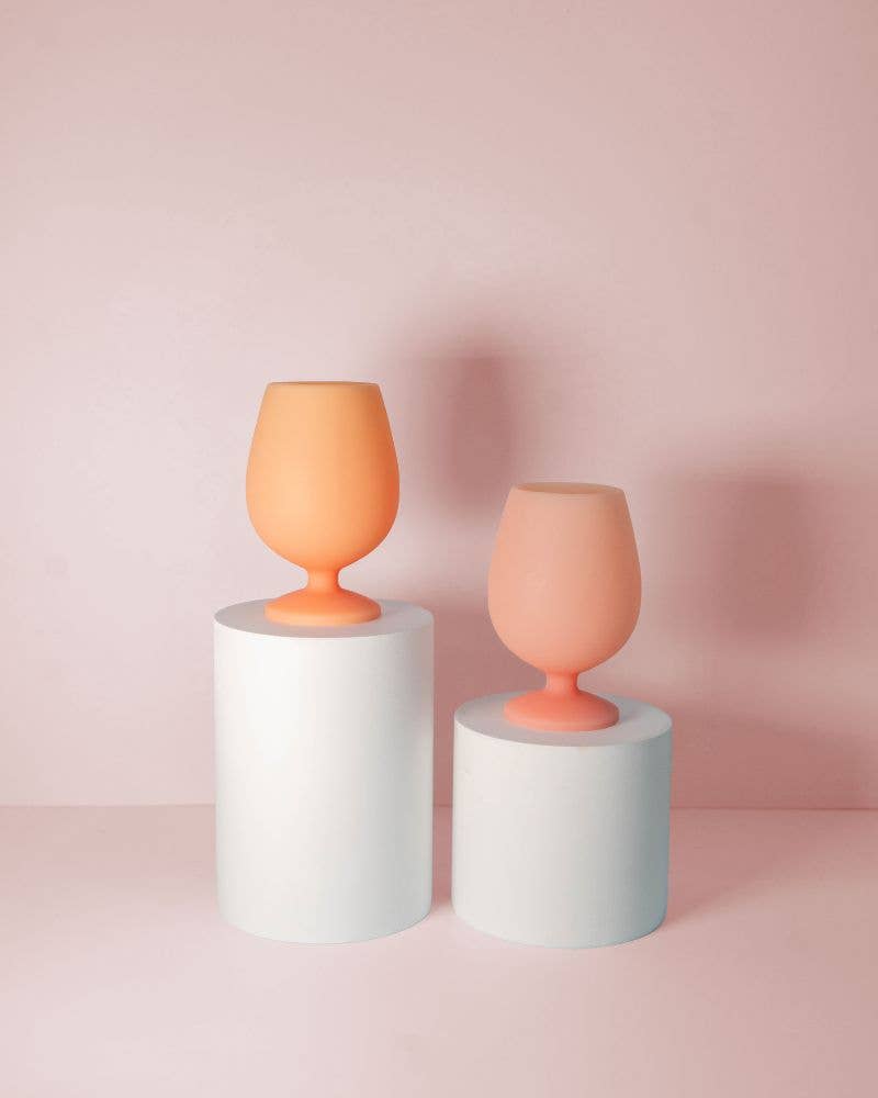 Colour every experience with peach + petal silicone 'stemm' glasses by Porter Green.