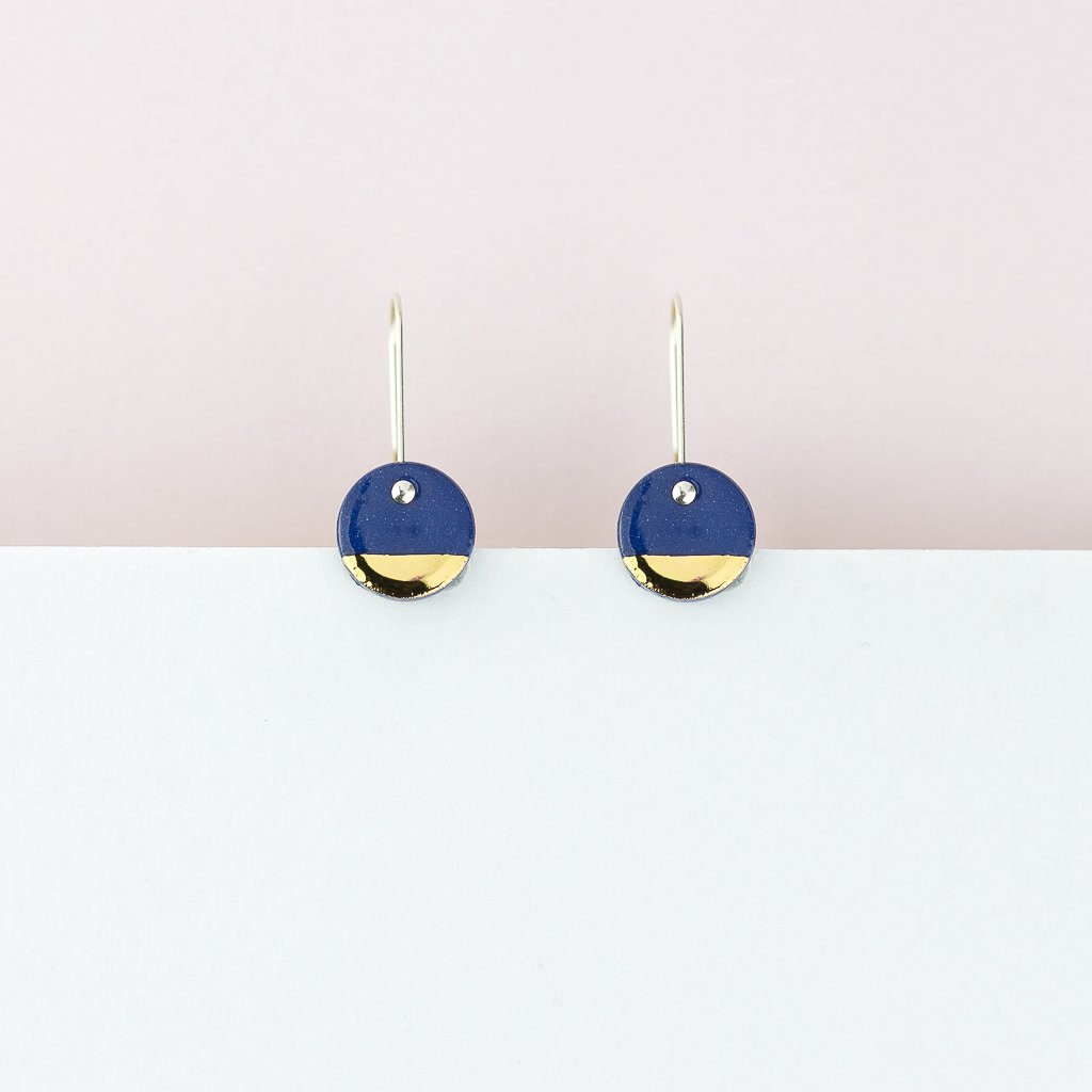 erin lightfoot-How cute are these! Our everyday staple earrings for a delicate spot of colour and subtle highlight of gold.   Each unique pair is cut from our black porcelain. Finished with gold lustre and sterling silver posts.