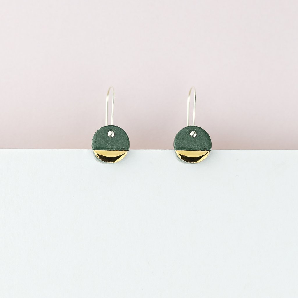 erin lightfoot-How cute are these! Our everyday staple earrings for a delicate spot of colour and subtle highlight of gold.   Each unique pair is cut from our black porcelain. Finished with gold lustre and sterling silver posts.