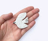 Togetherness design - The Speckled Bird brooch features a hand built ceramic piece that will add a friendly face to your outfit. Features a silver metal clasp on the reverse. As every ceramic piece has been made by hand they are each unique and may slightly differ from pictures in terms of shape and colour. 